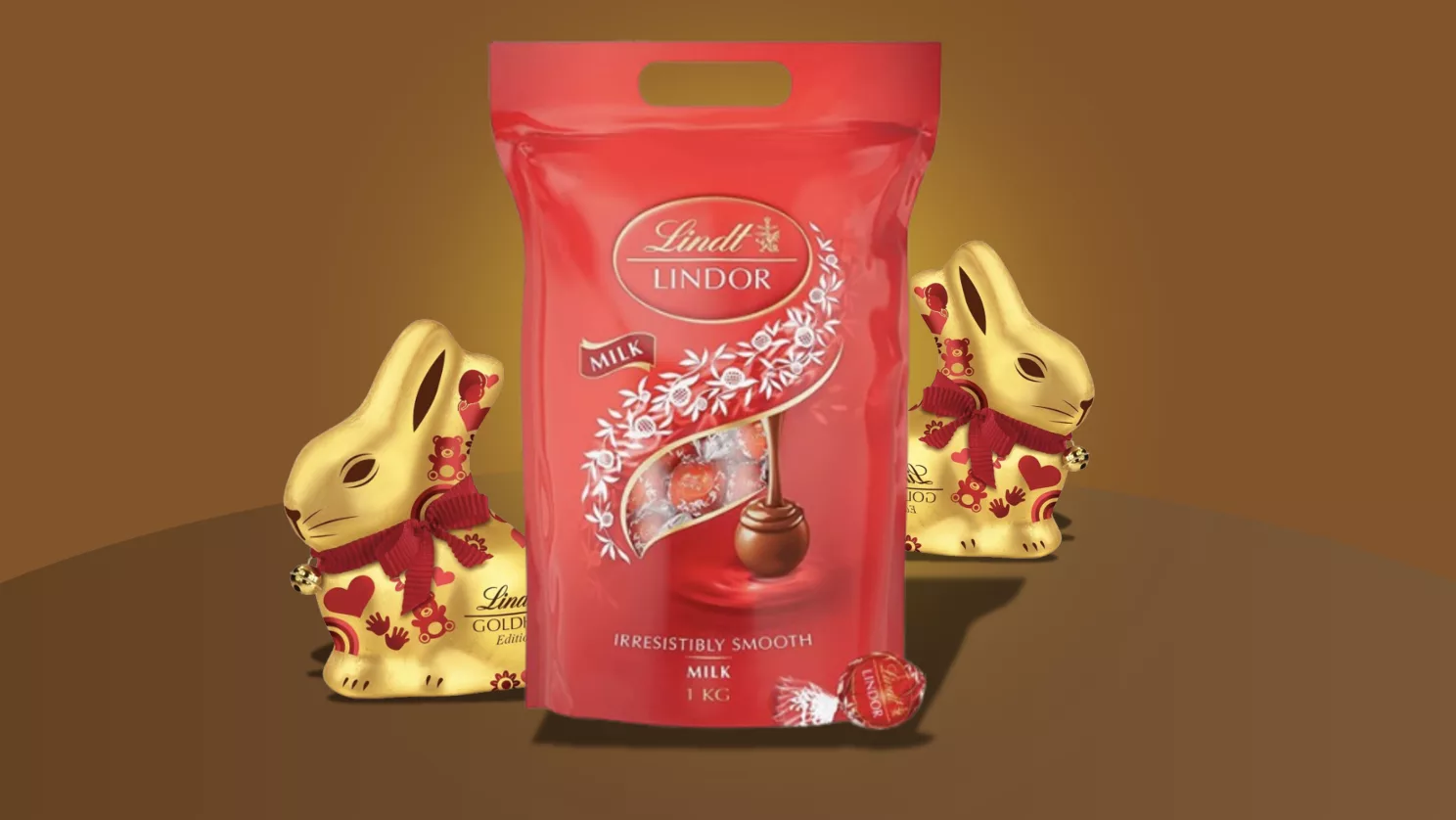 Lindor Kugeln Angebot mit Goldhasen vor braunem Hintergrund