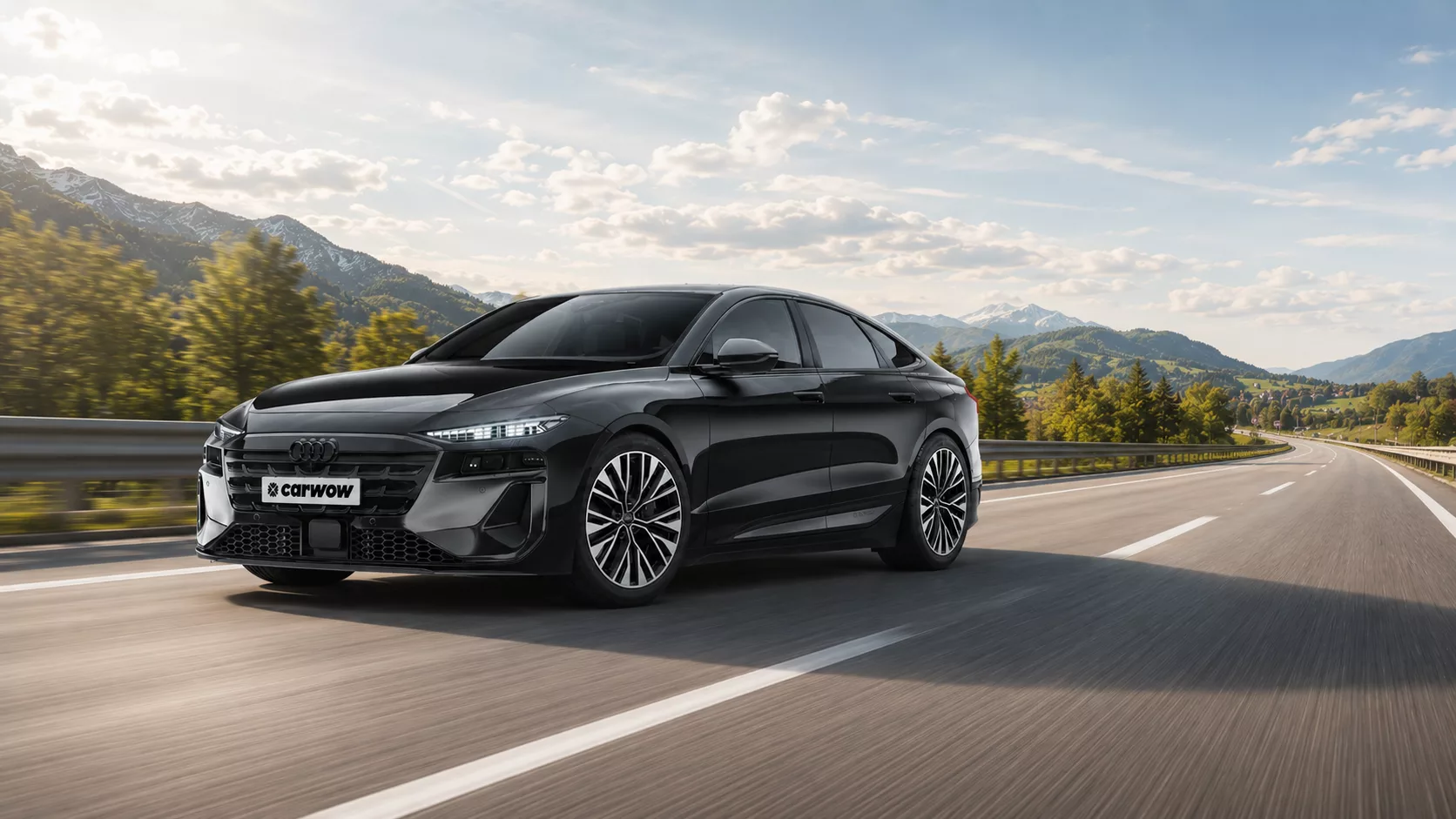 Schwarzer Audi A6 e-Tron Limousine fährt schnell auf Autobahn vor freundlichem Bergpanorama