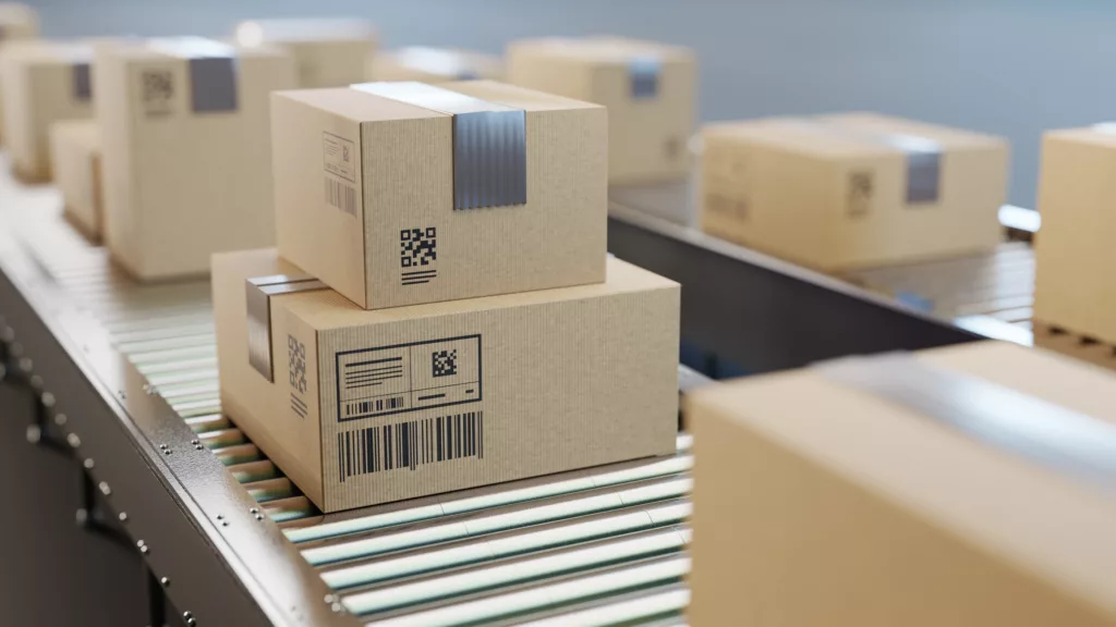 Automatic sorting, shipping and transportation concept. Packed boxes on the conveyor belt