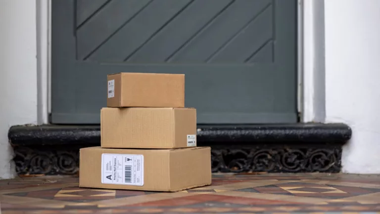 Close-up on a packages left on the porch of a house - online shopping concepts